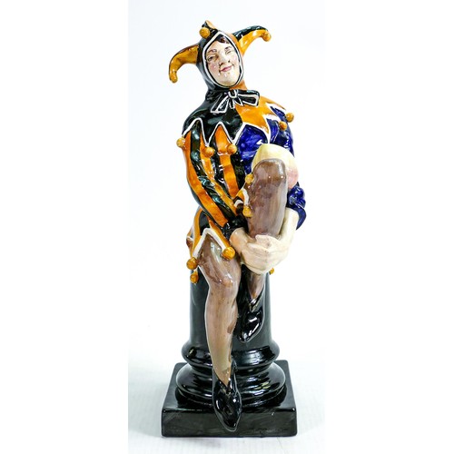 271 - Royal Doulton Jester HN1295. Impressed date for 1927, orange & blue colour way, height 25cm.