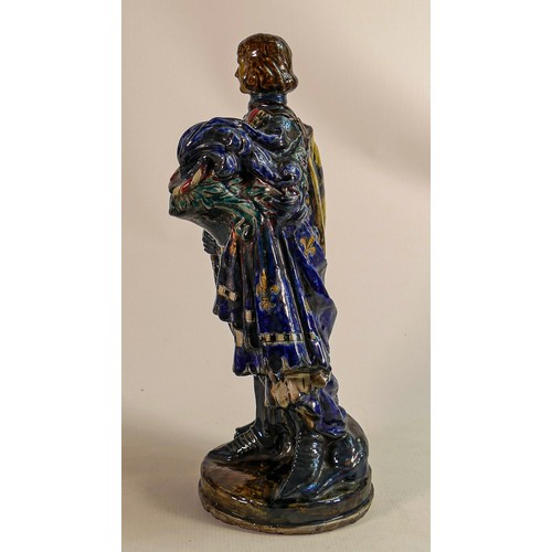 310 - Stanley Thorogood (1873-1953), 'Knight Robert for the Coronation', an earthenware figure, an early p... 