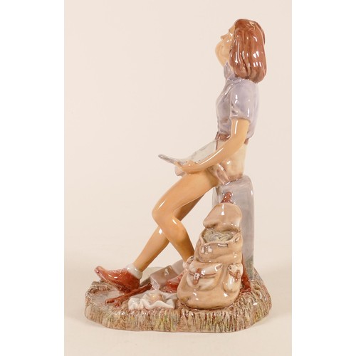 374 - Royal Doulton prototype figure of a lady hiker. Seated upon Lands End milestone. Impressed model num... 