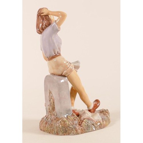 374 - Royal Doulton prototype figure of a lady hiker. Seated upon Lands End milestone. Impressed model num... 