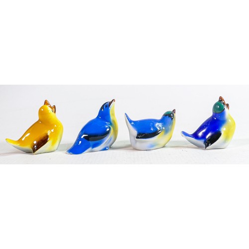 403 - A collection of Royal Doulton Fledging chicks to include - HN143, HN145C and two x HN137. (4)