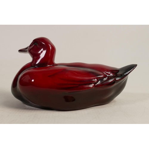 411 - Royal Doulton Flambe model of a nestling drake, signed by Noke, L.18 x h.9cm.