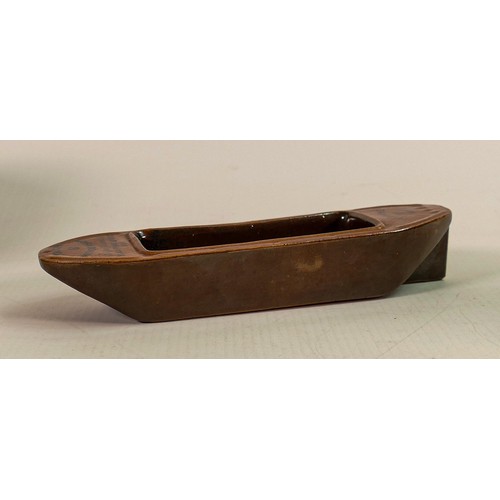 421 - A Doulton Lambeth Stoneware novelty advertising desk tidy, in the form of a Thames barge, the prow p... 