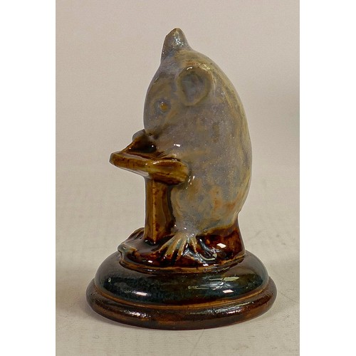 423 - George Tinworth for Doulton Lambeth, a comical figure of a mouse writing, in a two tone blue and bro... 