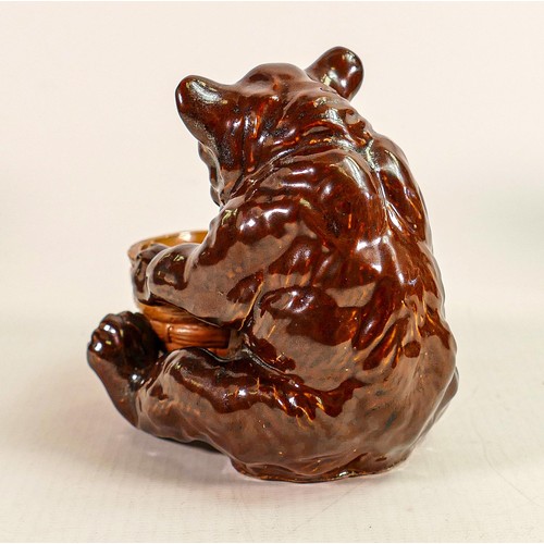 424 - A Royal Doulton Lambeth stoneware model of a seated bear with honeypot, impressed factory marks to b... 