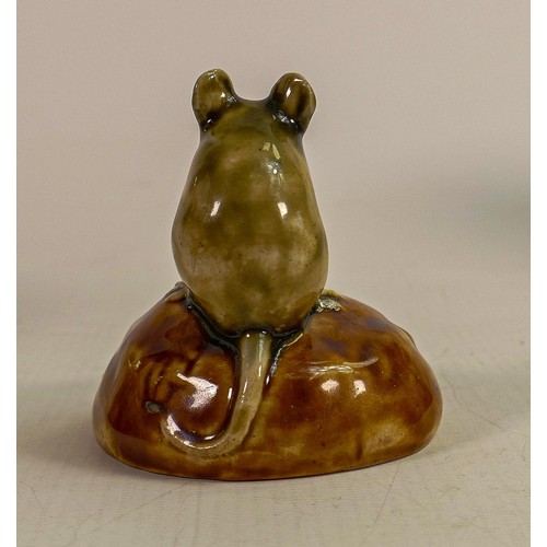 430 - George Tinworth for Doulton Lambeth, A mouse seated on a bun holding a raisin, in a green and brown ... 