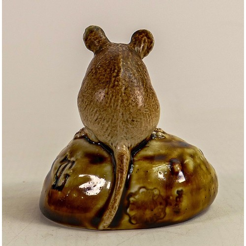 433 - George Tinworth for Doulton Lambeth, a mouse seated on a bun holding a raisin, in a two tone brown c... 