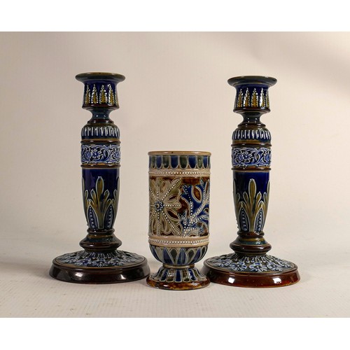 442 - Doulton Lambeth embossed stoneware candlesticks & spill vase, height of tallest 20cm. (3)