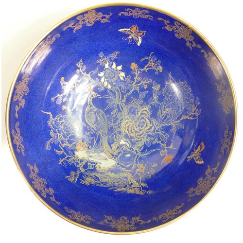 594 - A collection of blue & gilt Carltonware and similar items with floral, birds of paradise & temple de... 