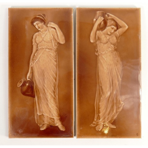 687 - Pair of early 20th century painted tiles with images of Art Nouveau ladies, each 30.3 x 15cm.