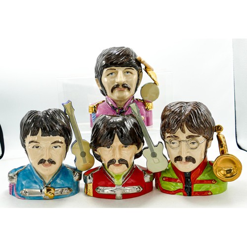 832 - Set of four Kevin Francis / Peggy Davies limited edition character jugs of the Beatles, for the Pop ... 