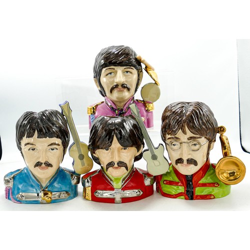 832 - Set of four Kevin Francis / Peggy Davies limited edition character jugs of the Beatles, for the Pop ... 