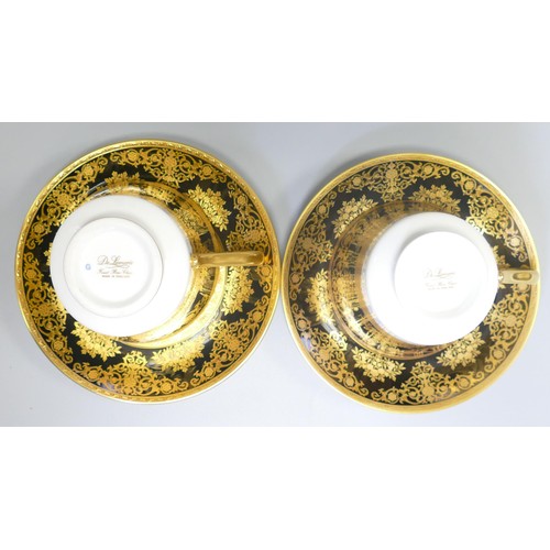 1005 - De Lamerie Fine Bone China heavily gilded Black Exotic Garden patterned cup & saucer sets, specially... 