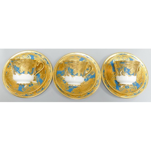 1008 - De Lamerie Fine Bone China heavily gilded Blue Royale patterned trios, specially made high end quali... 