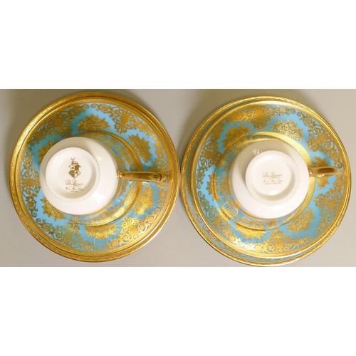 1018 - De Lamerie Fine Bone China heavily gilded Turquoise Exotic Garden patterned trios, specially made hi... 