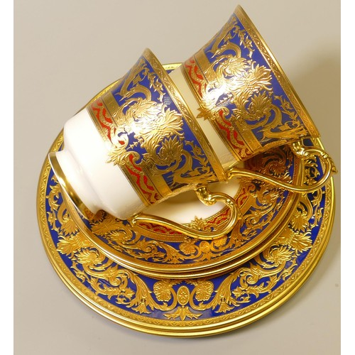 1024 - De Lamerie Fine Bone China heavily gilded Dark Blue Empress patterned trios, specially made high end... 