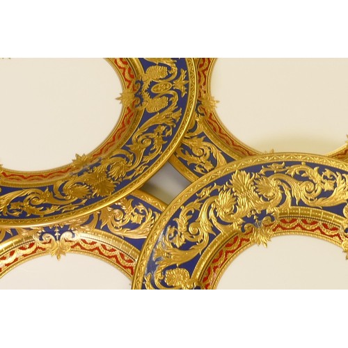 1027 - De Lamerie Fine Bone China heavily gilded Dark Blue Empress patterned lunch plates, specially made h... 