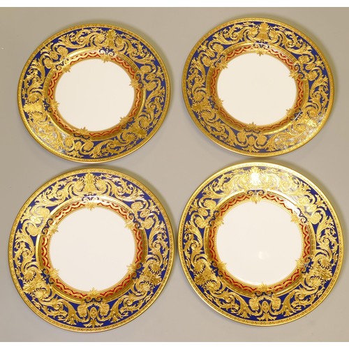 1027 - De Lamerie Fine Bone China heavily gilded Dark Blue Empress patterned lunch plates, specially made h... 