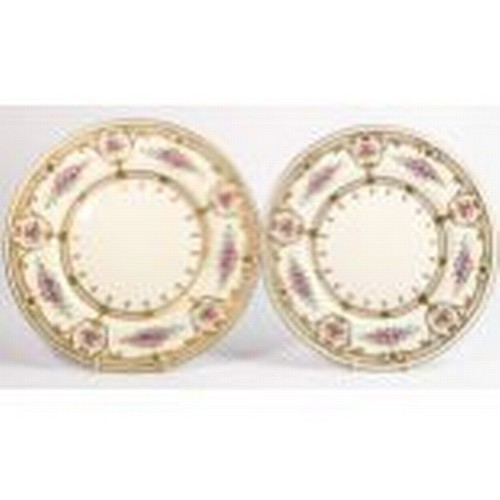 1092 - Pair of Wedgwood jewelled cabinet plates with floral decoration. Diameter 27.5cm. (2)