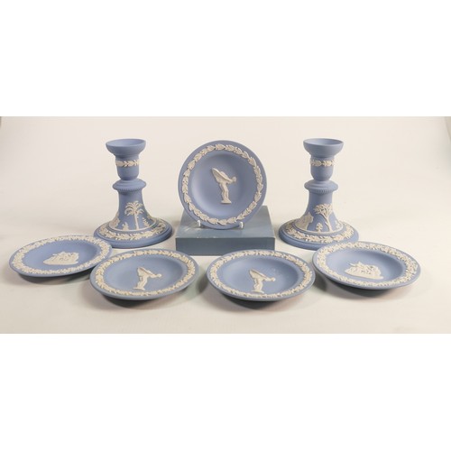 1107 - Wedgwood blue Jasperware to include - Rolls Royce pin dishes, candlesticks etc. (7)