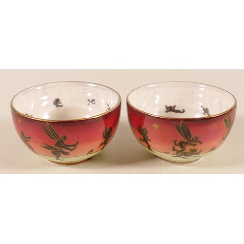 1119 - Pair of modern Wedgwood Fairyland Lustre Leaping Elves & Imps patterned miniature bowls, diameter 6.... 