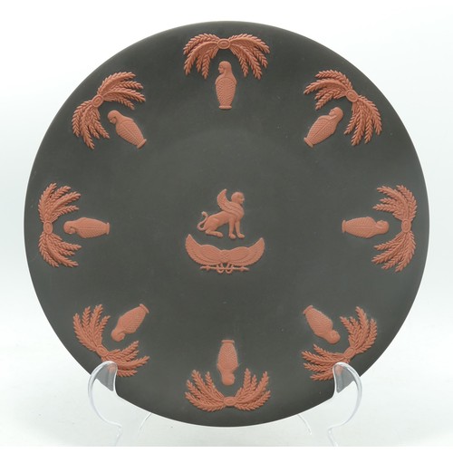 1144 - Wedgwood terracotta on black Jasper ware Egyptian themed plate, diameter 22cm.