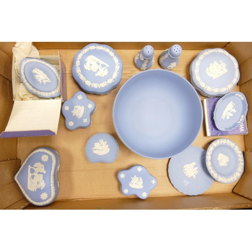 1147 - A collection of Wedgwood blue Jasper ware to include - large footed bowl, lidded pots, pin trays etc... 