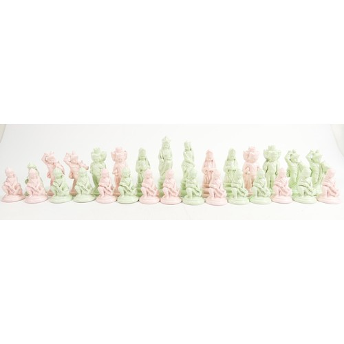 1533 - Minton prototype John Bell design chess set, glazed in pink & green, 32 pieces, height of king 11cm.