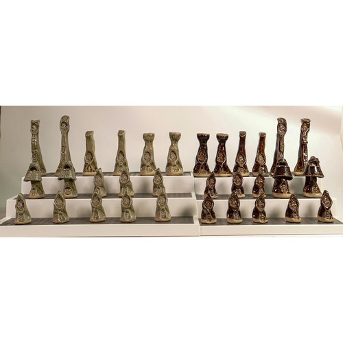 1556 - Two mid century studio pottery chess sets, 64 pieces, height of largest King 12.6cm.