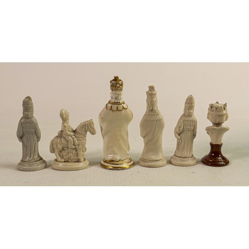 Six 19th century English porcelain chess pieces, tallest 9cm. (6)