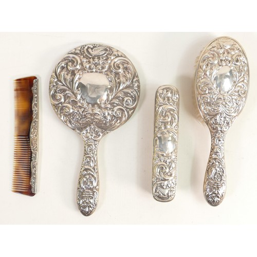 1797 - 4 piece silver ladies dressing set, hallmarked for Birmingham 1968, comprising hand mirror, comb and... 