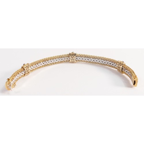 1922 - 14ct gold two colour bracelet, a heavy piece set with rubies and sapphires, gross weight 39.3g. In e... 