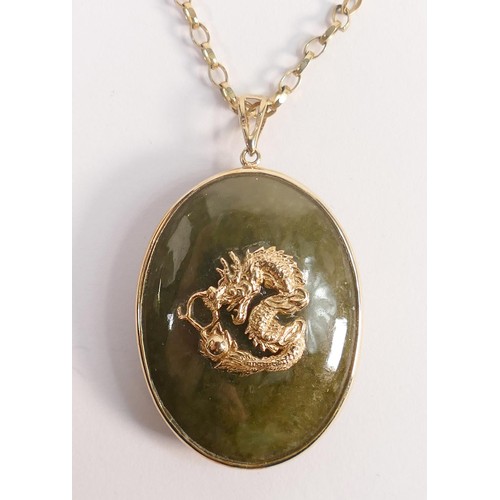 1923 - 9ct gold mounted large Chinese style Jade (or similar green stone) pendant decorated with dragon and... 