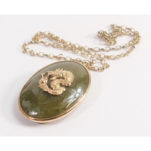 1923 - 9ct gold mounted large Chinese style Jade (or similar green stone) pendant decorated with dragon and... 