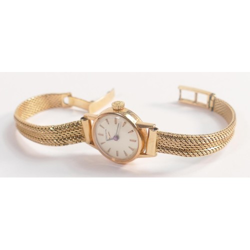 1924 - 18ct gold Longines ladies wristwatch and 18ct gold bracelet.  Gross weight 22.7g.  Winds, ticks and ... 