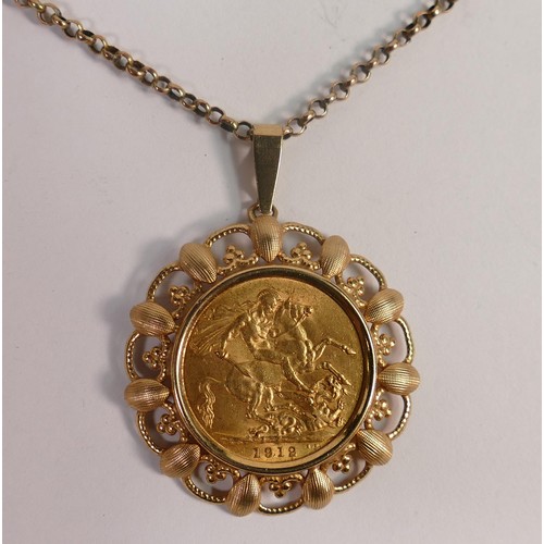 1953 - Gold Full Sovereign dated 1912 in 9ct gold mount & chain, 14.8g.