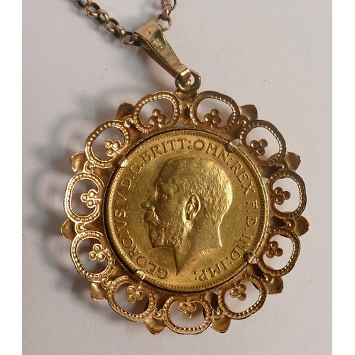 1953 - Gold Full Sovereign dated 1912 in 9ct gold mount & chain, 14.8g.