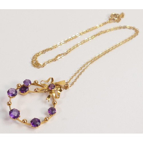 1960 - Antique yellow metal bow tie drop pendant & chain, pendant set with 7 amethyst stones, 2.6g.