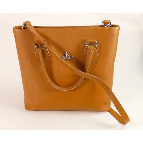 396 - Vivienne Westwood tan leather hand / shoulder bag with silver logo. Comes with original dust bag and... 