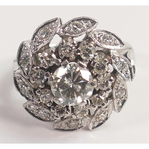 1964 - 14k white gold diamond cluster ring, centre round diamond approx .80ct surrounded by 10 smaller diam... 