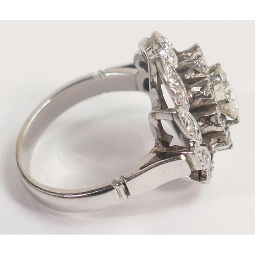 1964 - 14k white gold diamond cluster ring, centre round diamond approx .80ct surrounded by 10 smaller diam... 