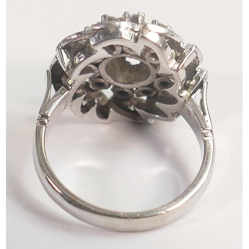 1964 - 14k white gold diamond cluster ring, centre round diamond approx .80ct surrounded by 10 smaller diam... 