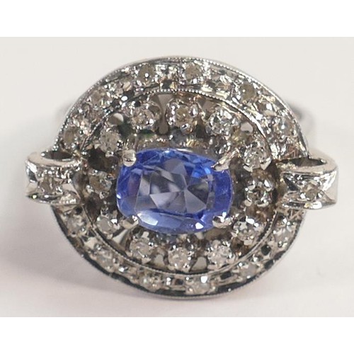 1965 - 14k white gold sapphire diamond ring, centre oval sapphire (approx 1.75ct) surrounded by diamonds, s... 