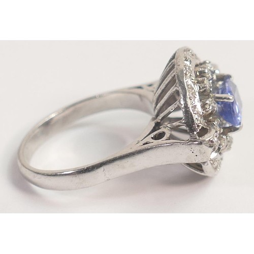 1965 - 14k white gold sapphire diamond ring, centre oval sapphire (approx 1.75ct) surrounded by diamonds, s... 