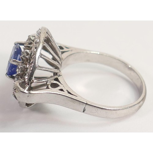 1965 - 14k white gold sapphire diamond ring, centre oval sapphire (approx 1.75ct) surrounded by diamonds, s... 