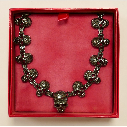 715 - Butler & Wilson costume jewellery pewter effect diamante skull necklace