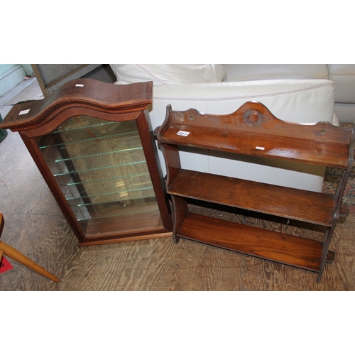 624 - Wall hanging curio display cabinet together with a set of wall hanging open book shelves.