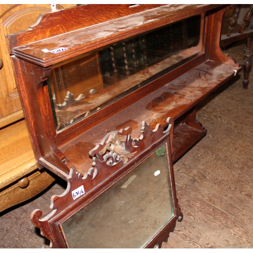 631 - Edwardian oak over-mantle mirror together with a carved oak hallway mirror, size of largest 106cm W.