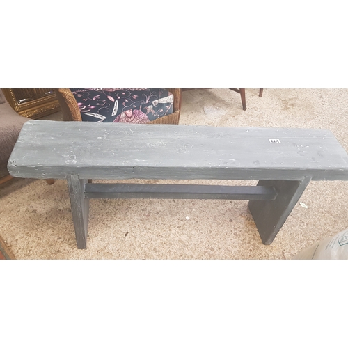 667 - Grey painted bench made from scaffold planks.