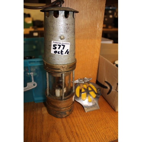 577 - A minors Lamp together with Vintage AA membership Badge